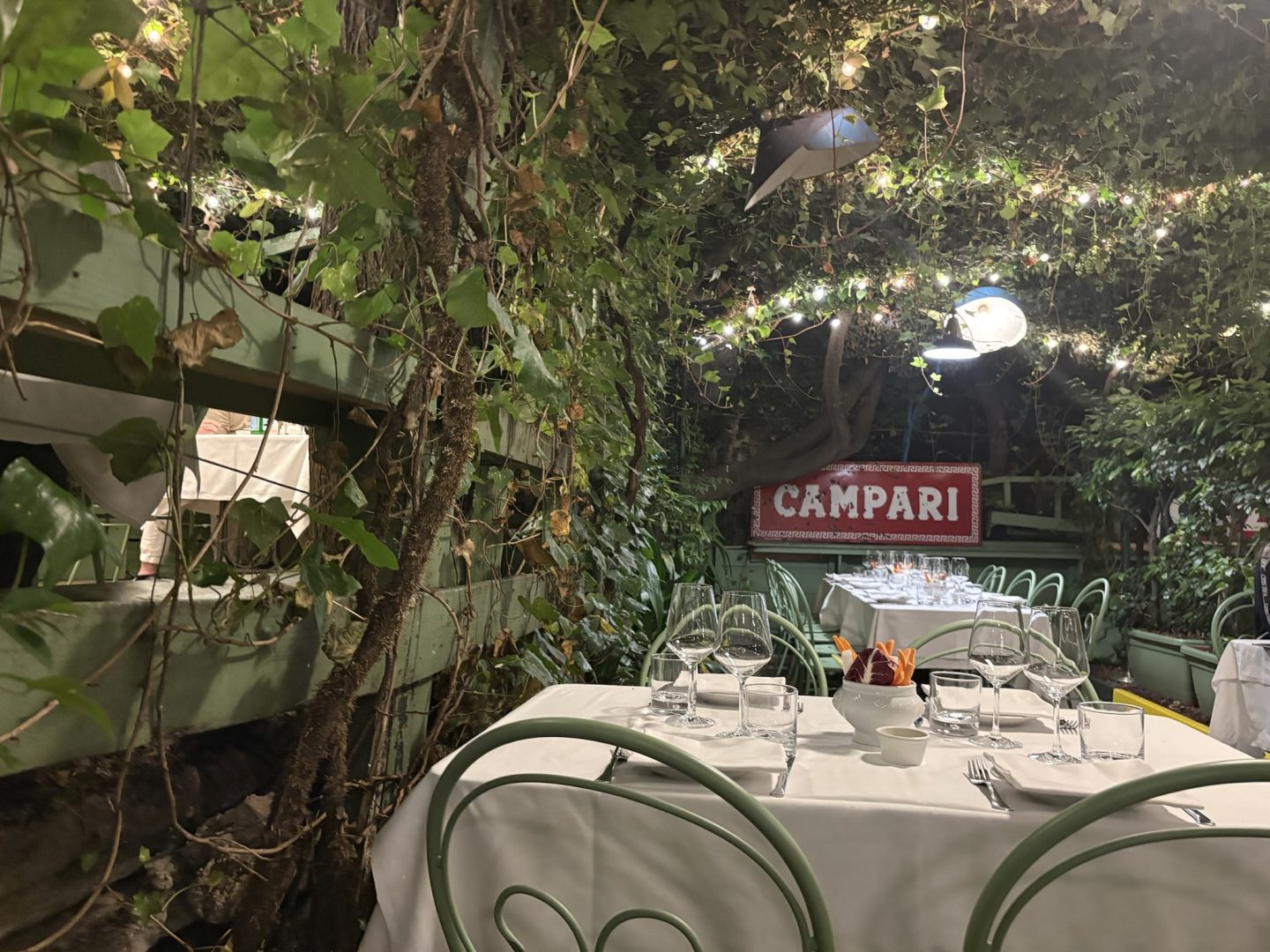 Garden dining at Osteria del Binari in the Navigli district