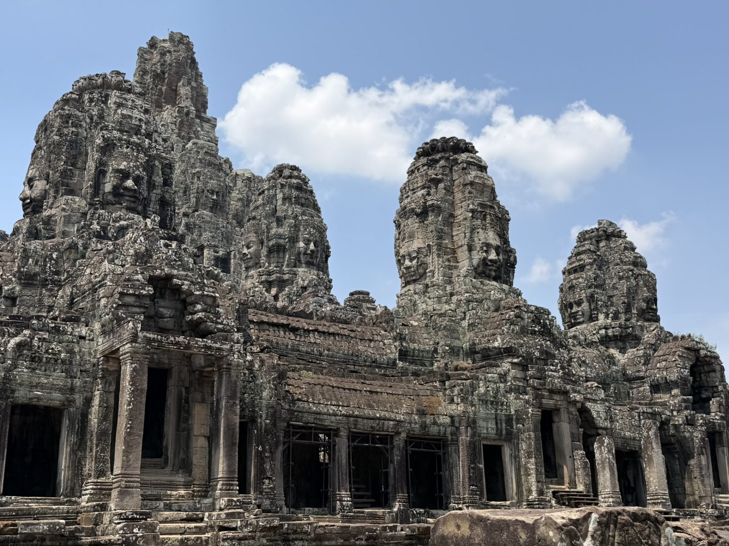 Carved stone faces at Bayon temple in Angkor Thom