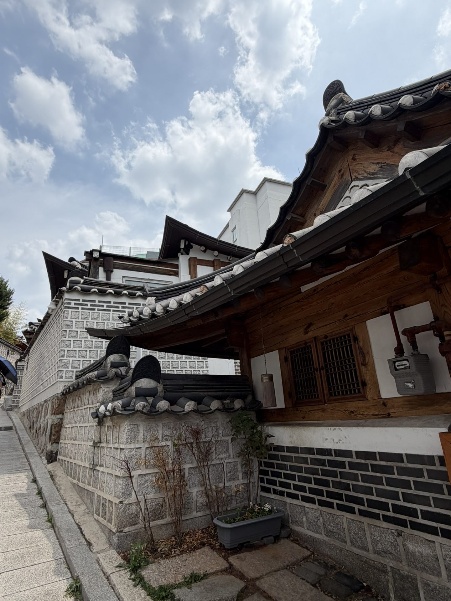 Traditional hanok house and stone wall in Bukchon Hanok Village, Seoul