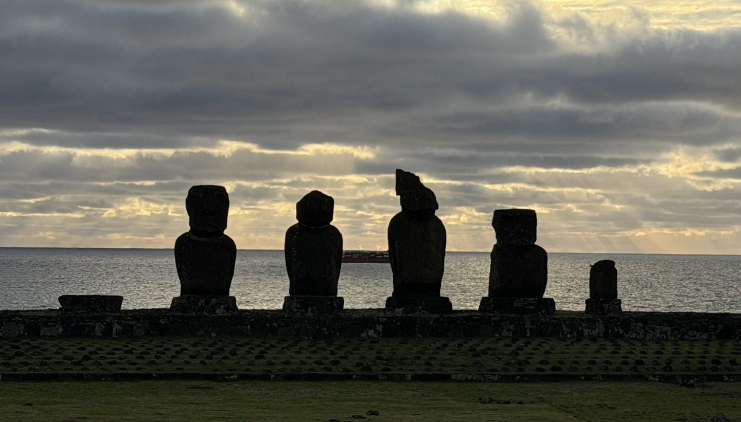 Moai at Ahu Vai Uri in the Tahai ceremonial complex at sunset on Rapa Nui