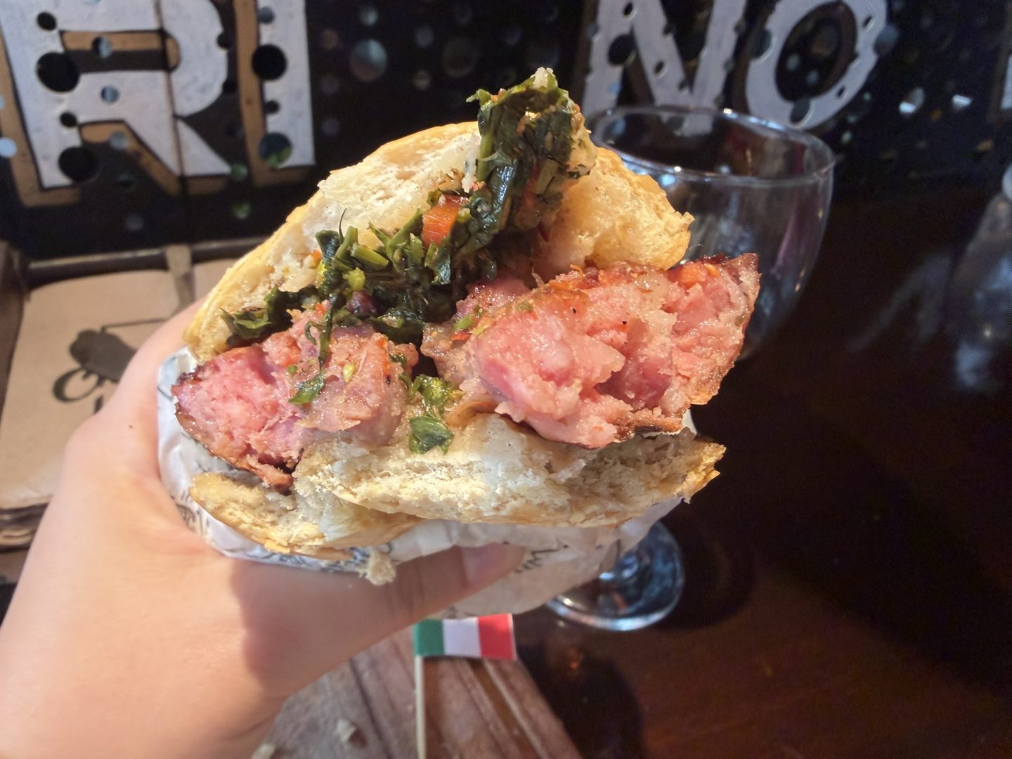 Choripán with grilled Argentine sausage and chimichurri in Buenos Aires